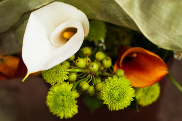 Closeup of calla lilies in a wedding flower arrangement