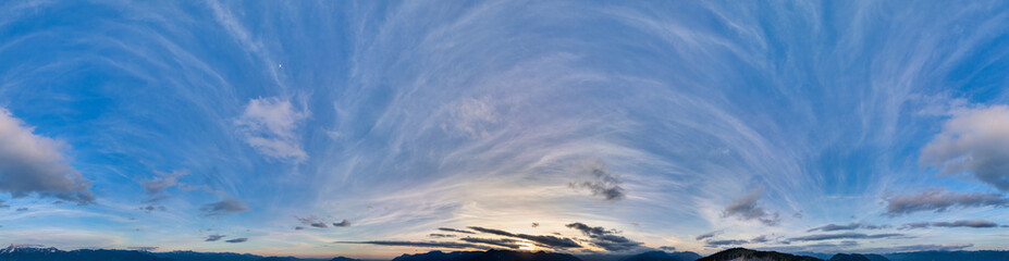 Aerial panorama Cloudscape of Canadian Mountain Landscape in Valley.