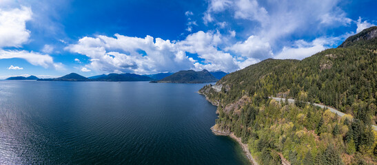 Sea to Sky Highway in Howe Sound, West Coast Ocean with Mountain Landscape.