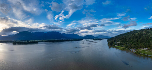 Aerial panorama of Canadian Mountain Landscape in Valley. Sunny Sunset