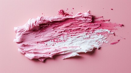 Fototapeta premium A pink and white brush stroke on a pink background