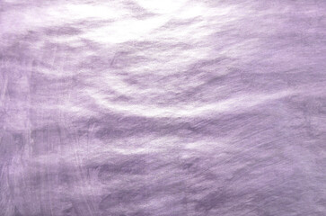 
lilac background of stains with a metallic silk effect