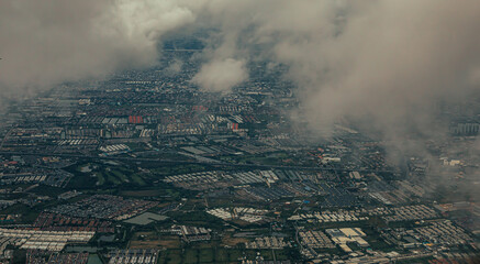 cityscape under clouds 