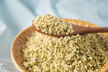 Bowl with healthy hemp seeds, healthy organic superfood.