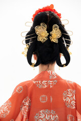 A woman wearing ancient Chinese clothing against a white background.