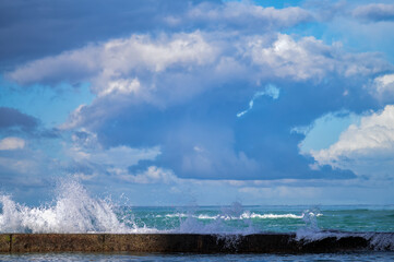 Rough Ocean Waves Breaking Against a Sea Wall in Hawaii.