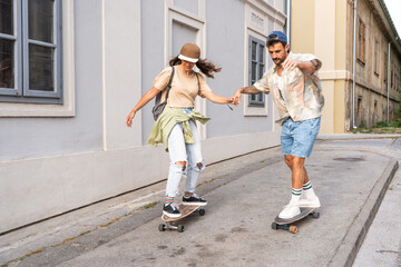 Simple living. Freedom as lifestyle. Young couple enjoying outdoor and sunset. Having fun on nice weather. Man and woman, hipsters, generation Z with cool attitude.