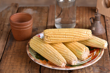corn natural food healthy delicious vegan cooked green corn on wooden table