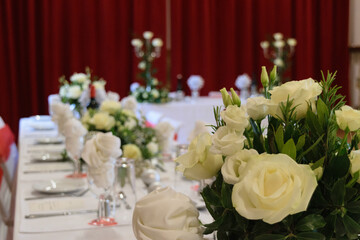 Elegant Wedding Reception Table with White Roses