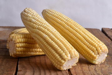 corn natural food healthy delicious vegan cooked green corn on wooden table