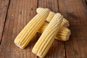 corn natural food healthy delicious vegan cooked green corn on wooden table