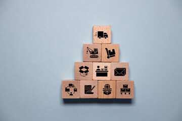 Online shopping or e-commerce concept with online business icons on wooden cubes against white background