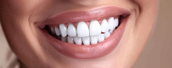 Obraz premium Close-up of a woman's smile with natural teeth.