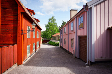 Empty alley amidst buildings in city