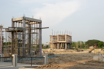 A construction site with two buildings under construction
