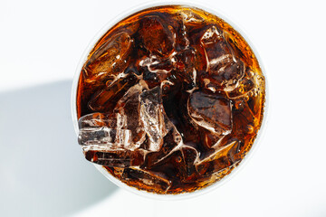 Cola drink,Cola with ice cubes in glass top view isolated on white background, clipping path...