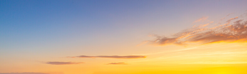 Clouds and orange sky,Real majestic sunrise sunset sky background with gentle colorful clouds...