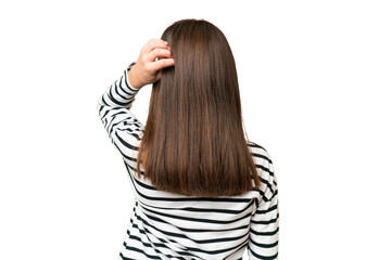 Little caucasian girl over isolated background in back position and thinking