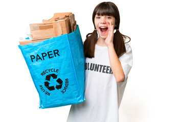 Little Caucasian girl holding a recycling bag full of paper to recycle over isolated background shouting with mouth wide open