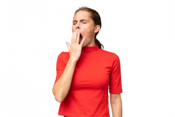 Young caucasian woman over isolated background yawning and covering wide open mouth with hand
