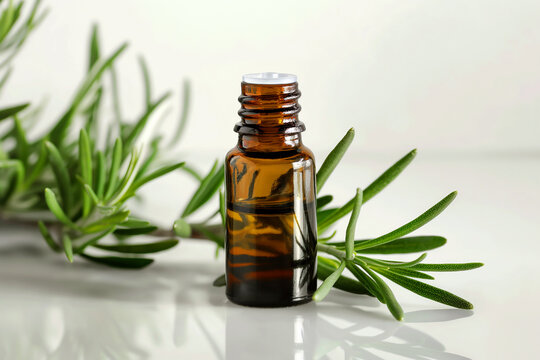 Rosemary aromatherapy essential oils in dark glass bottle	