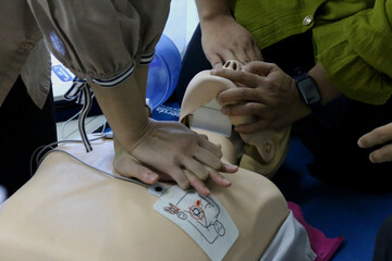 Emergency and first aid class on cpr doll, Cardiac life support	