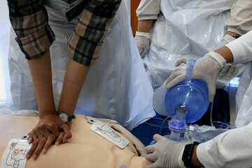 Emergency and first aid class on cpr doll, Cardiac life support	
