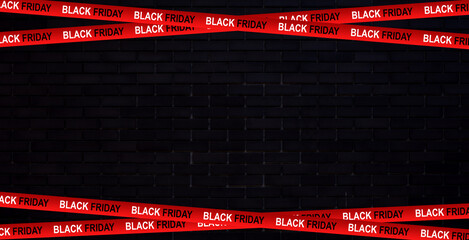 3d red ribbons for Black Friday sale on  dark brick wall background. Crossed ribbons. Graphic...