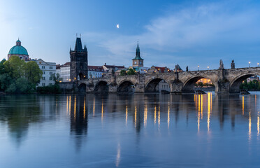 Obraz premium Prague, Czech Republic, Charles Bridge (Karluv Most) reflecting in Vltava river at blue hour