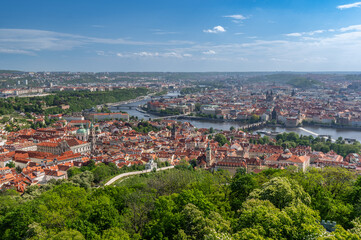 Fototapeta premium Mala Strana and Old Town historical districts divided by Vltava River seen from Petrin hill, Prague, Czech Republic