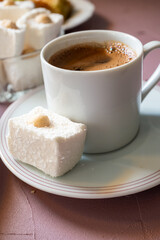 Turkish coffee in white cup close-up