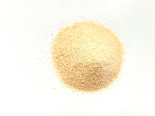 Garlic powder on a bright background.