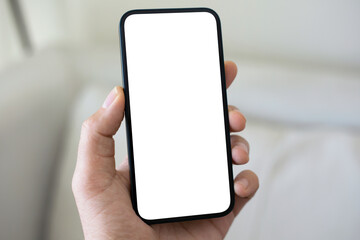 male hand hold phone with isolated screen background  light room