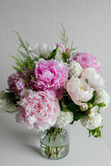 Beautiful pink flowers bouquet background. Blooming peony close-up with water drops, morning dew. Wedding backdrop, Valentine's Day concept. Blossom, flower