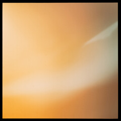 Abstract blurry background in the black frame, gradient orange.