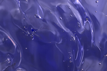 Macro photo purple gel texture, abstract background with bubbles. blur and selective focus.