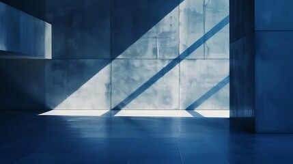 Abstract forms come alive in the interplay of light and shadow on a dark blue wall, creating a captivating minimalist composition.