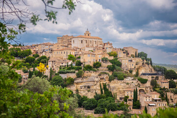 A view of a medieval place in France. There is Gordes city, travels in Provence.