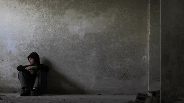 Depressed Young Man in Abandoned Building Unemployment Depression Concept HD