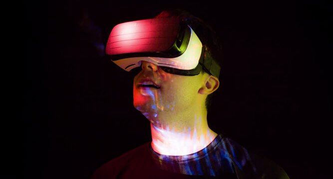 Man Virtual Reality Console Headset Play 3D Gaming Innovation Internet Entertainment Technology Surprised Fun Videogame Futuristic Watching Leisure Footage Hitech Device Recreational Amazing Scared