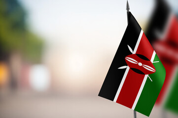 Small flags of Kenya on a blurred background