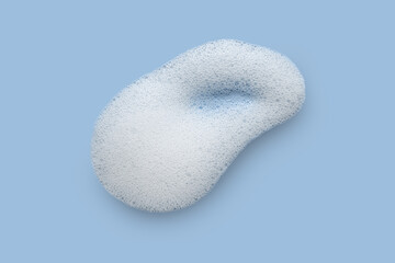 White skincare cleansing foam smear on a blue background