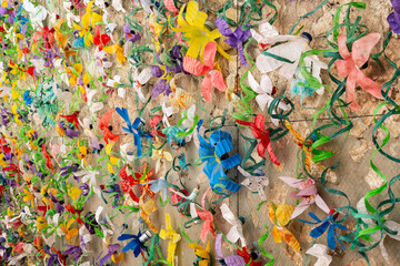 Flower wall decoration with plastic bottles made from plastic waste. Concept: Waste recycling and...