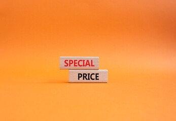 Special Price symbol. Concept word Special Price on wooden blocks. Beautiful orange background....