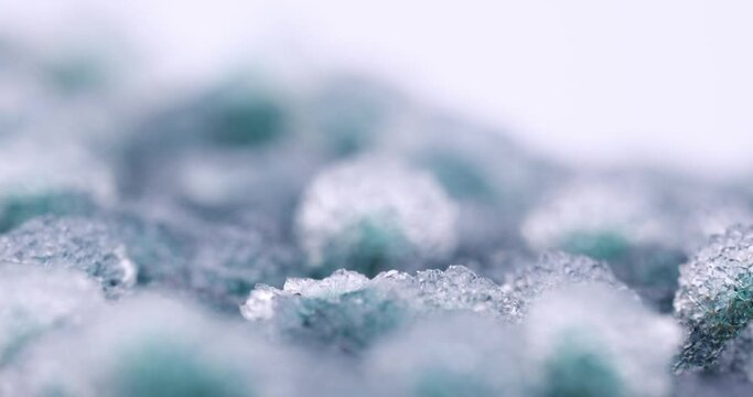 Quartz on green chalcedony footage. macro detail background. close-up Rough raw unpolished semi-precious gemstone