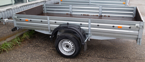 Open road trailer. Shop selling car trailers.