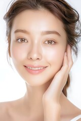 Fototapeta premium close up face portrait of young pretty Asian woman with bright flawless skin, beauty cosmetic or skincare fashion portrait with copy space