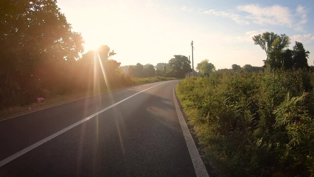 Via Francigena - a paved road leaving Sutri at sunrise, province of Viterbo, Lazio, Italy