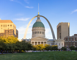 Old Courthouse in St. Louis  at sunset framed by Arch