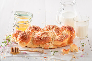 Homemade and hot golden challah for a tasty breakfast.